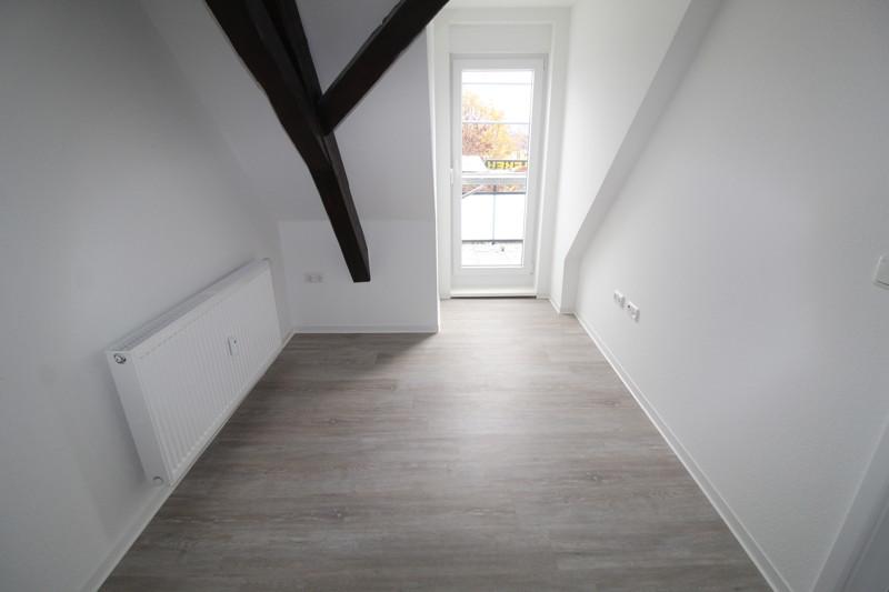 Perfekt für Singles - kleine DG-Wohnung mit Balkon und Fassadenvollwärmeschutz zimmer