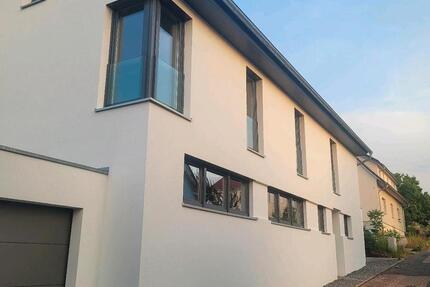 Einfamilienhaus mit 2 Garagen Neubau 4 zimmer