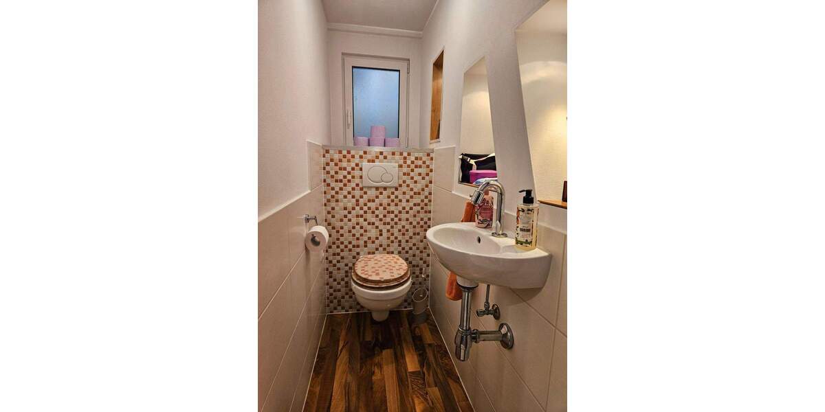 Mehrfamilienhaus mit zwei Wohnungen und Laden 6 zimmer