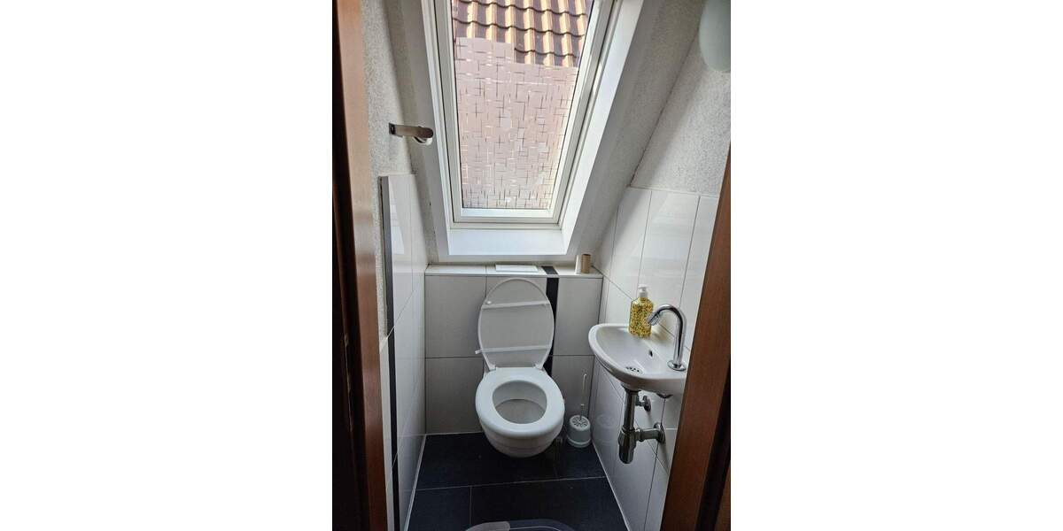 Mehrfamilienhaus mit zwei Wohnungen und Laden 6 zimmer