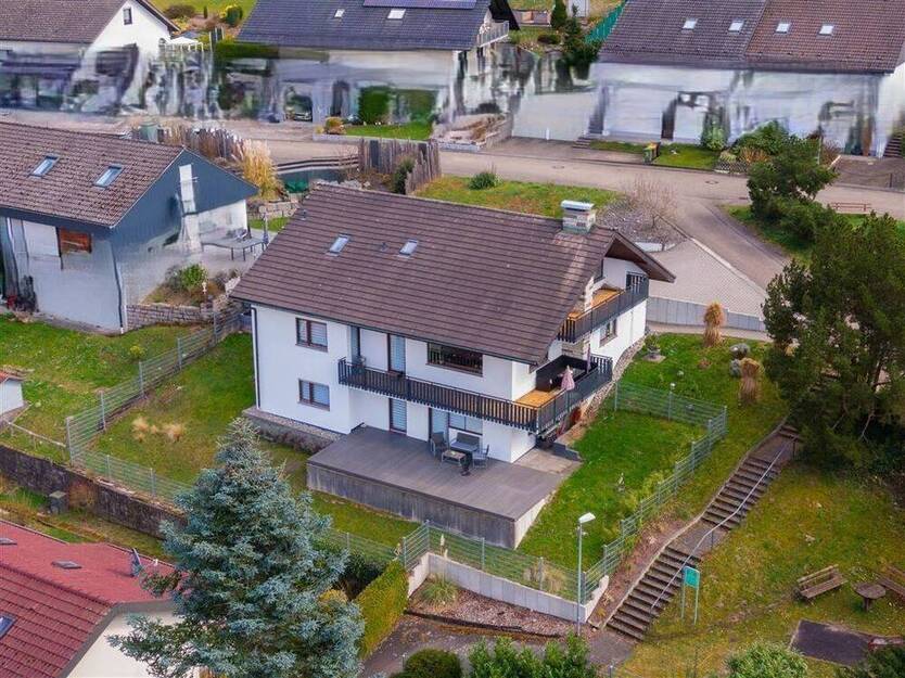Vielseitiges Einfamilienhaus in idyllischer Lage - perfekt für Familien oder mehrere Generationen